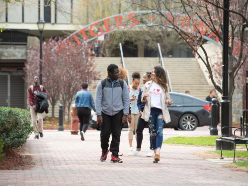 David Asafn Adjaye SPAA'21 and Amaly Garcia SPAA'20 walk to class at Rutgers–Newark campus